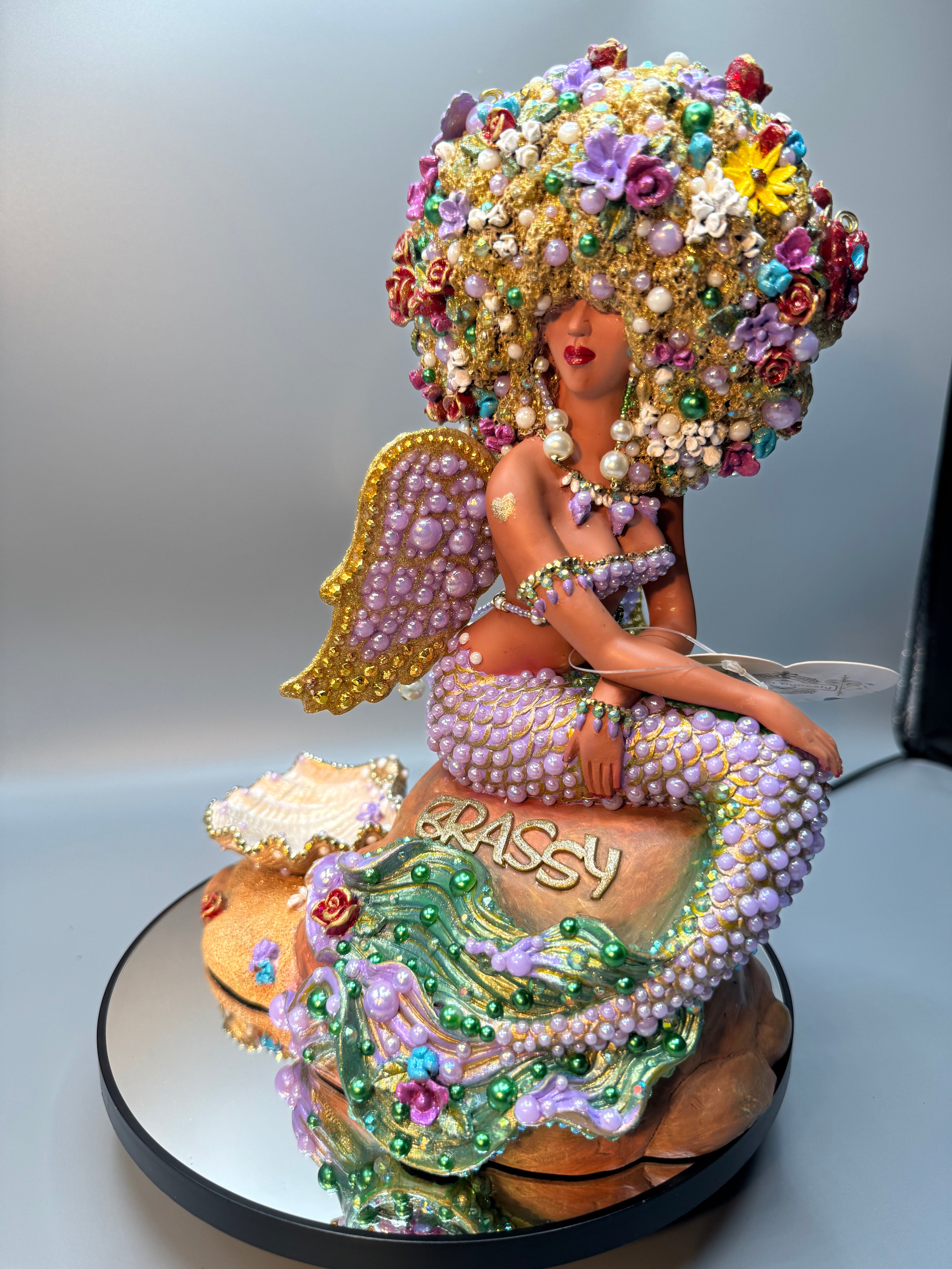 Custom lavender and gold Afro Mermaid figurine named Reina Solé. Hand-painted OOAK art doll with pearl and jewel rhinestones, radiant angel wings, sparkling butterflies, and glittering crown. Fantasy décor by Black artist Clover Jené Mermaid.