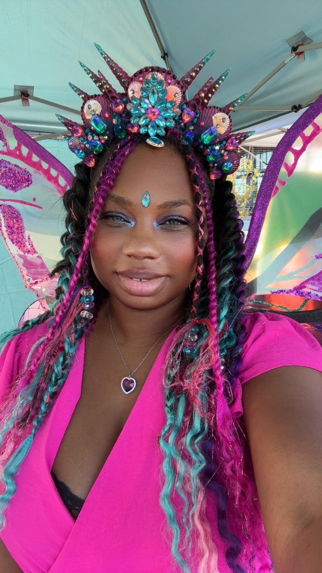 Clover Jené, Black fantasy artist and creator of Enchanted Roots and Wonders, wearing a jeweled fairy crown